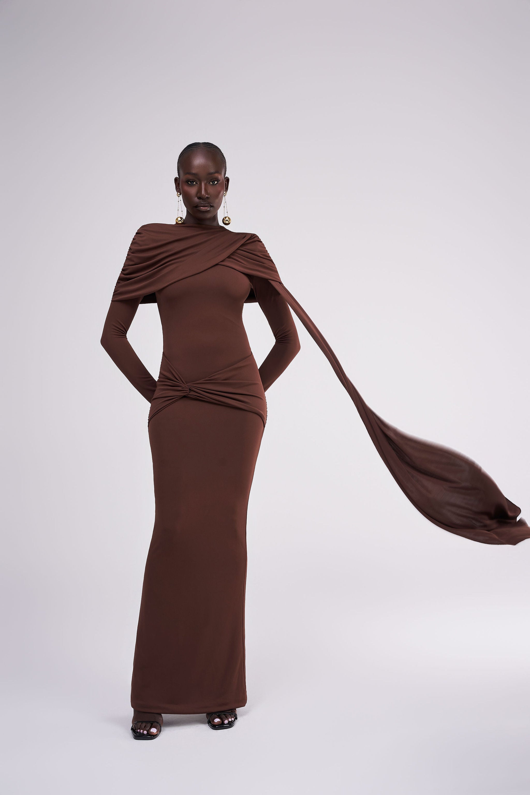 HUDA | CAPE PANEL RUCHED LONG SLEEVE MAXI DRESS CHOCOLATE